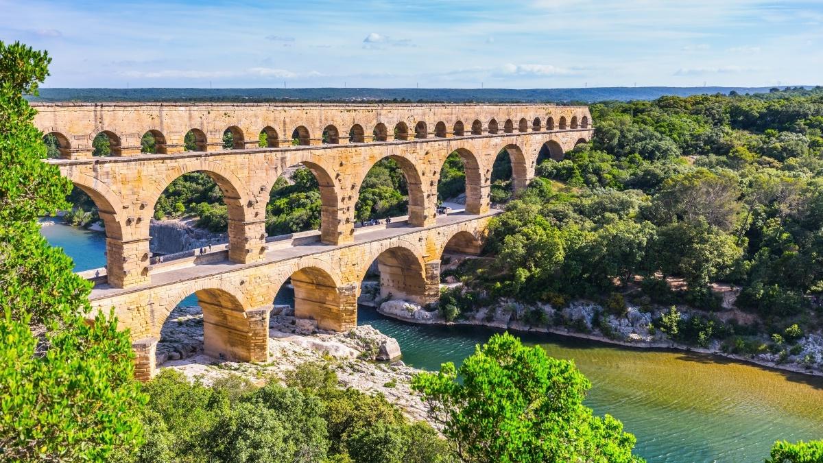 Pont du Gard, a three-tier ancient Roman aqueduct, crosses the Gardon river in southern France